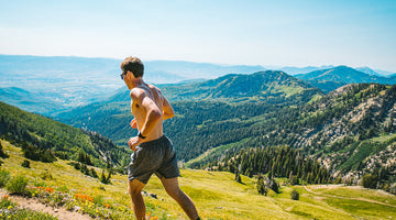 Man running in the mountains.