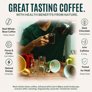 Promotional graphic for Lion's Mane whole bean coffee. A person in a green shirt is shown pouring dark coffee from a glass carafe into a small glass cup on a wooden table surrounded by various mugs.